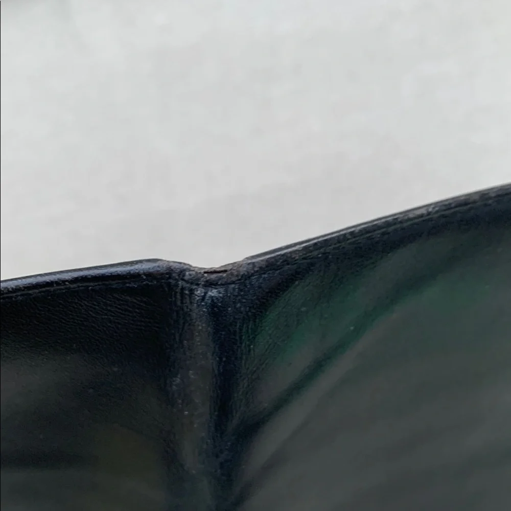 Dunhill Elegant Black Wallet with Gold Accents